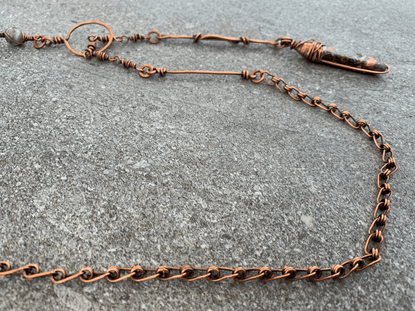 detail of handmade chain on lariat